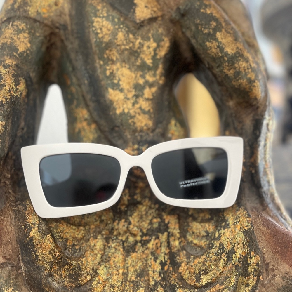 White sunglasses by MCM Designs